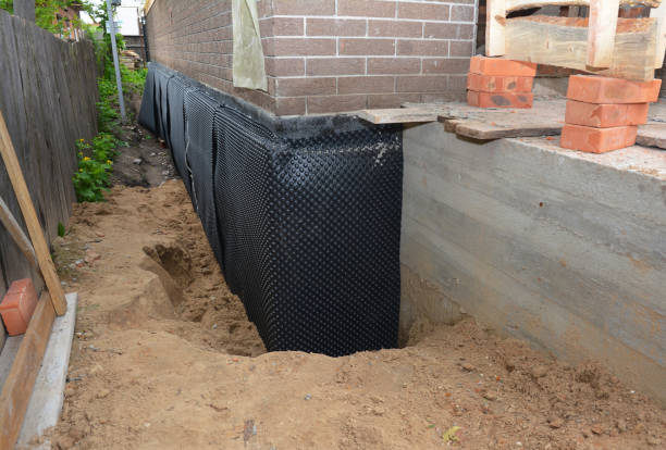 Happy homeowners after waterproofing job in Newbern